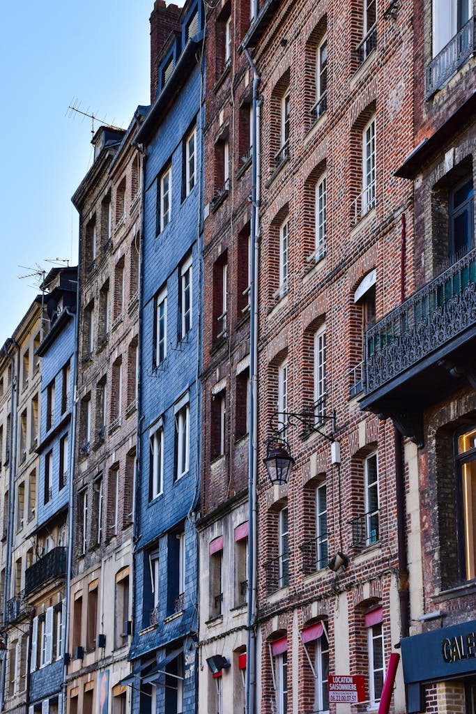 Charming historical houses in Honfleur, showcasing traditional European architecture in Normandy, France.