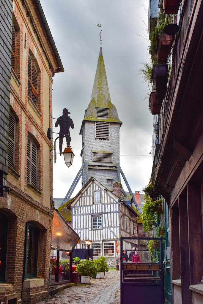 Discover the beautiful timber-framed architecture in the charming streets of Honfleur, Normandy, France.